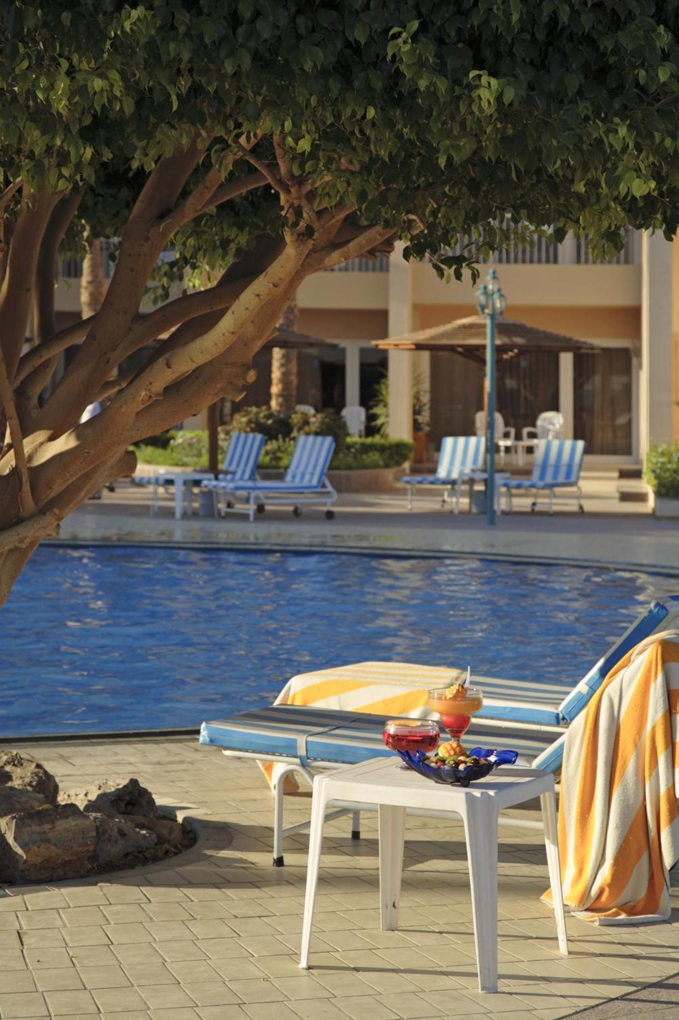 Hurghada Suites & Apartments Serviced By Marriott Exterior photo Pool at the Hilton Sharm El Sheikh